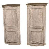 pair of large corner cupboards